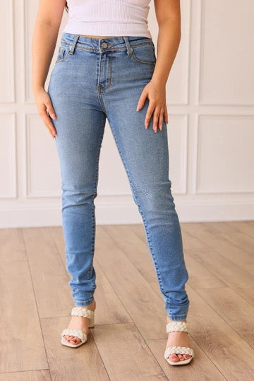 THE PARIS HIGH RISE LIGHT WASH SKINNY JEAN