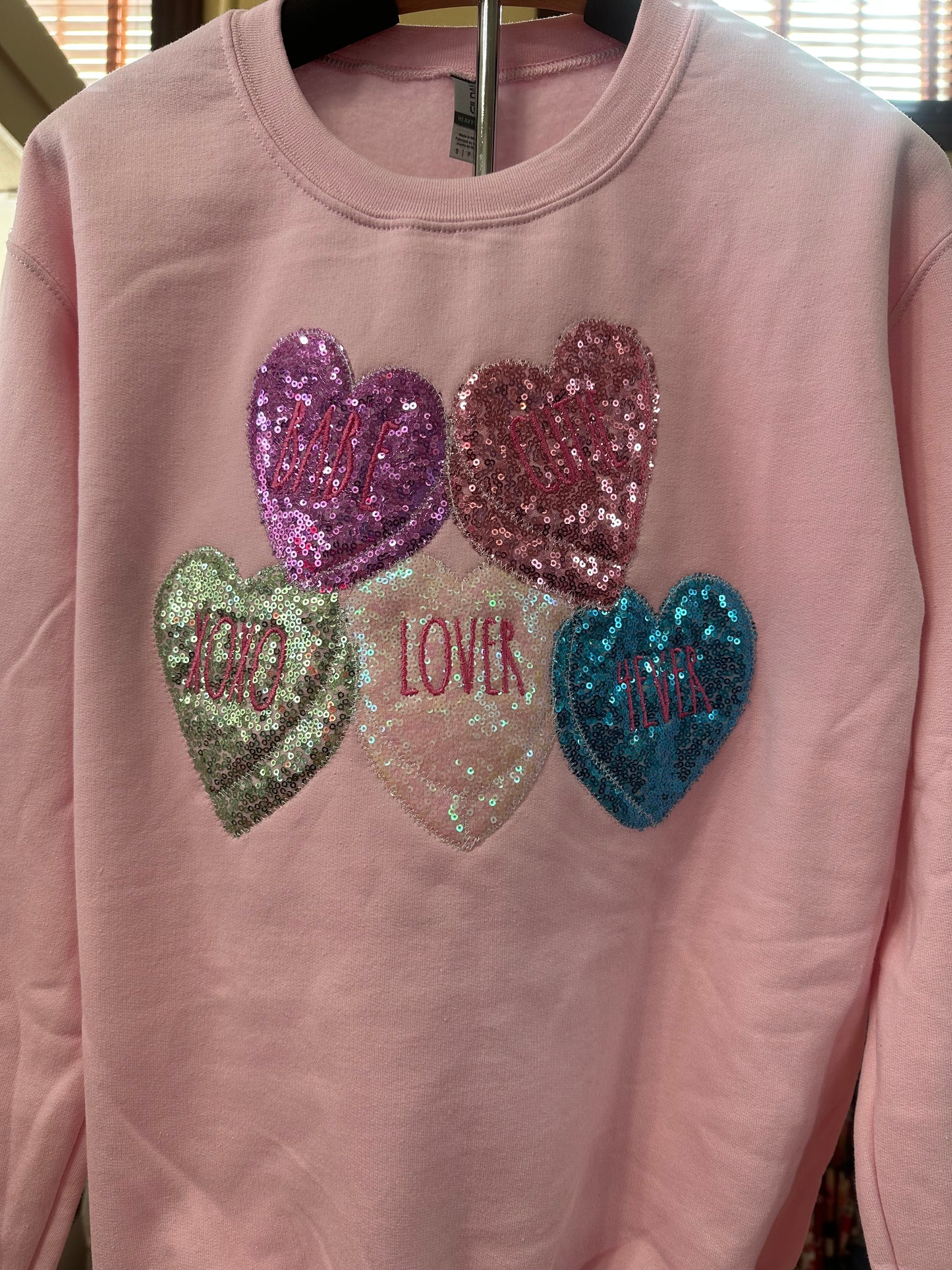 EMBROIDERED CONVERSATION HEARTS SWEATSHIRT